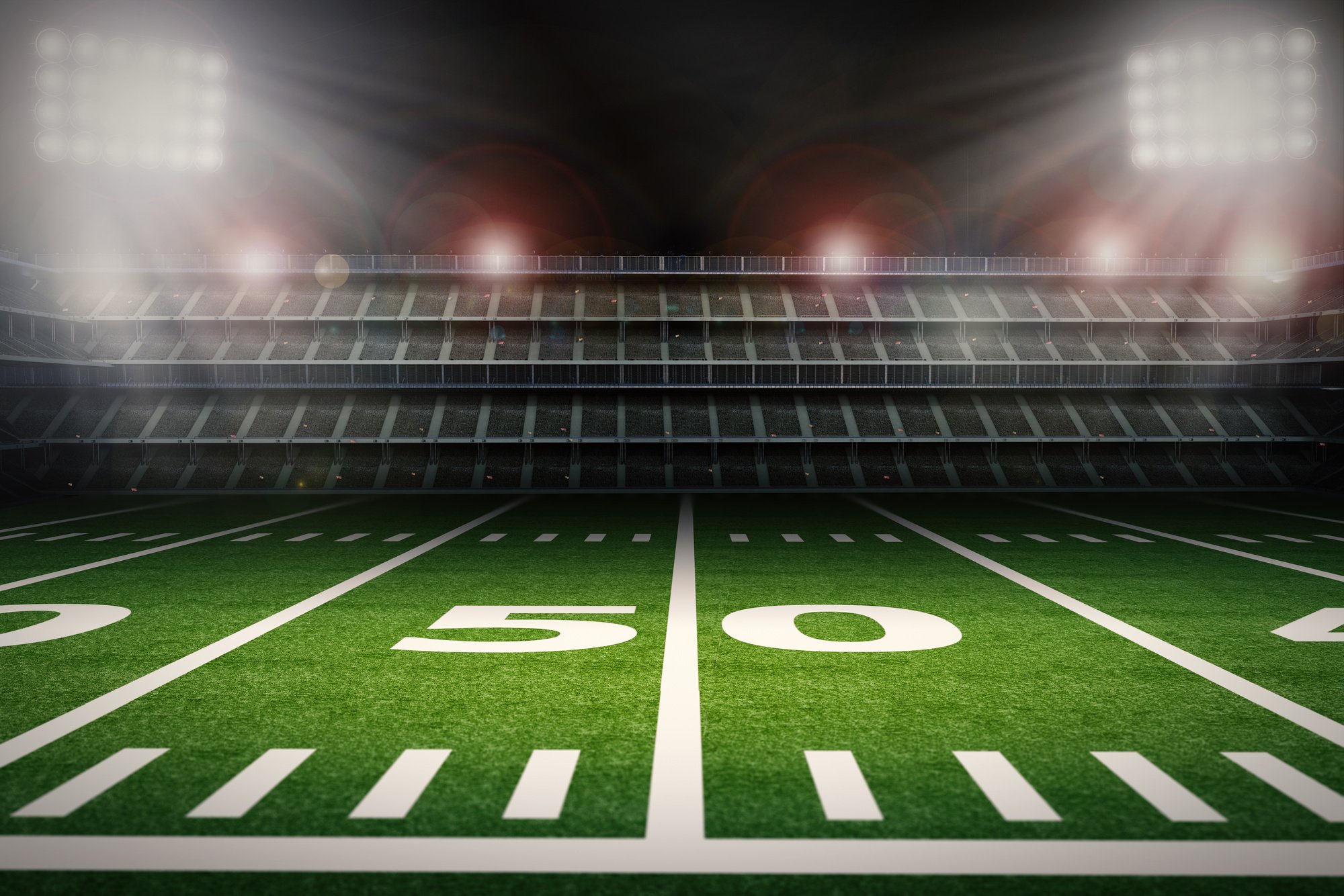 Empty American Football Stadium at Night